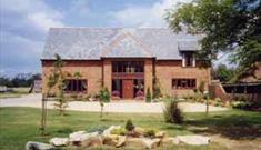 Beautiful 17th century barn, all rooms en-suite.  Good pub food close by.