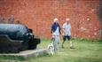 Dog walkers at Hurst Castle